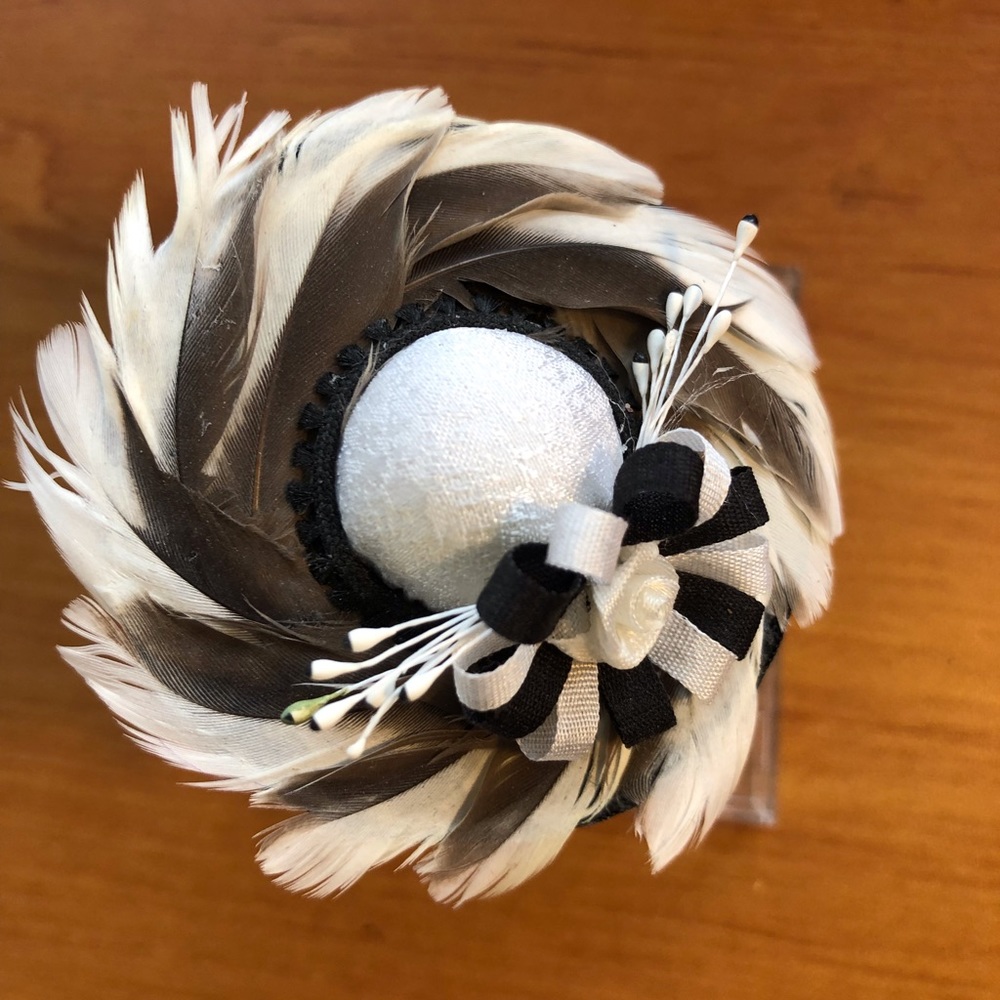 Mini hat hand crafted feathers flowers on golf tee stand with lucite bottom